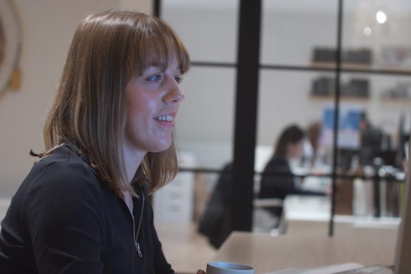 Helen at her computer in the Lewis Knox studio